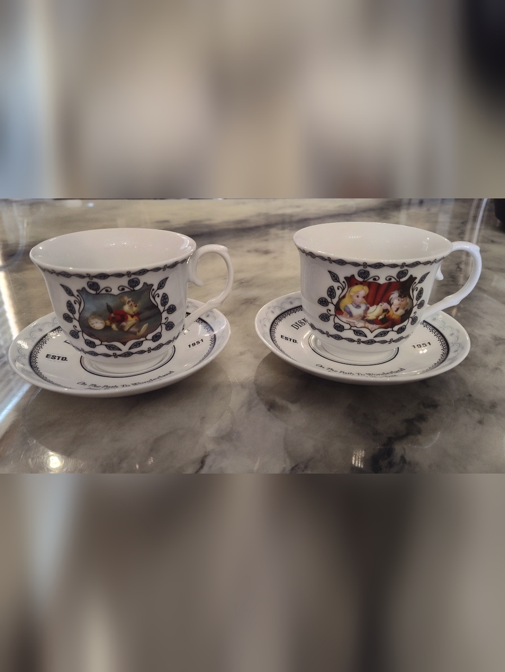Pair of Disney Park Exclusive Vintage Alice And Wonderland Teacups And Saucers